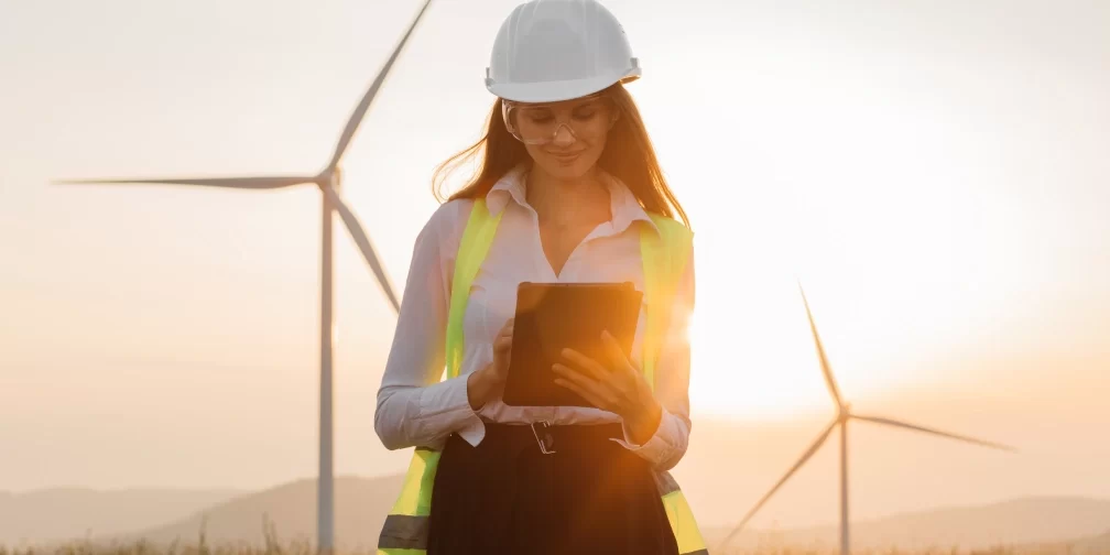 woman-in-helmet-working-with-tablet-at-renewable-e-2022-04-27-04-10-10-utc